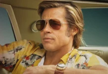 Brad Pitt como o dublê Cliff Booth