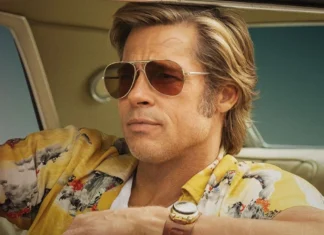 Brad Pitt como o dublê Cliff Booth