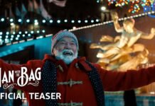 Arnold Schwarzenegger caracterizado como Papai Noel